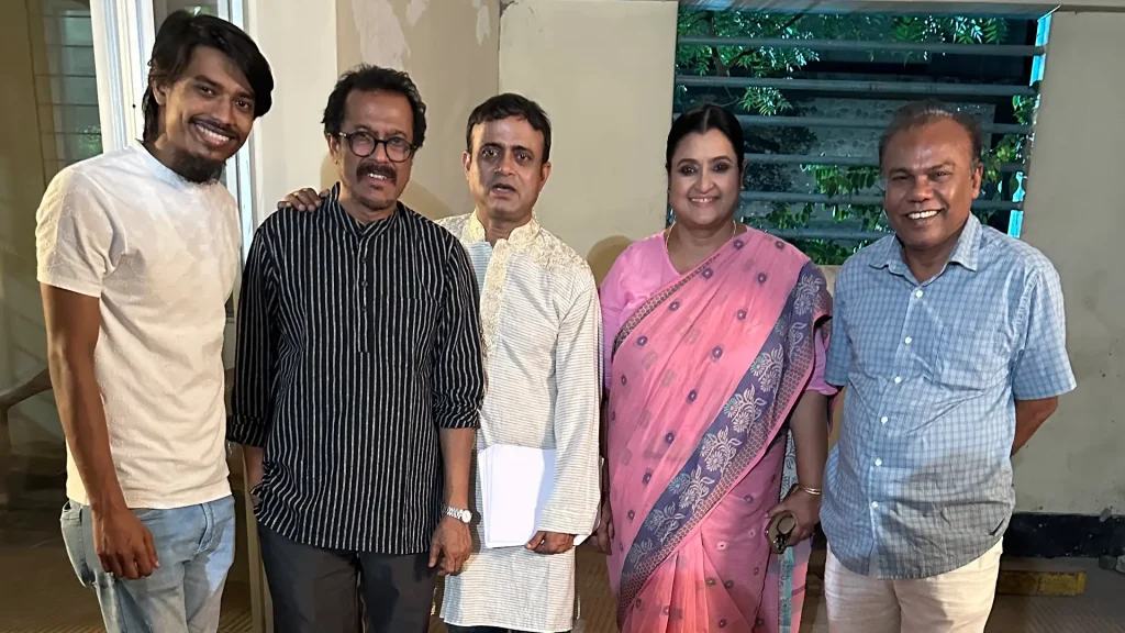 Faisal Khan Shuvo with cast members during 7 Flat er Qurbani production