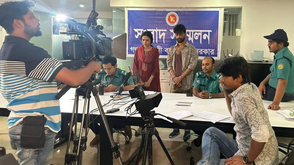 Faisal Khan Shuvo supervising a Harami scene on a police-station set